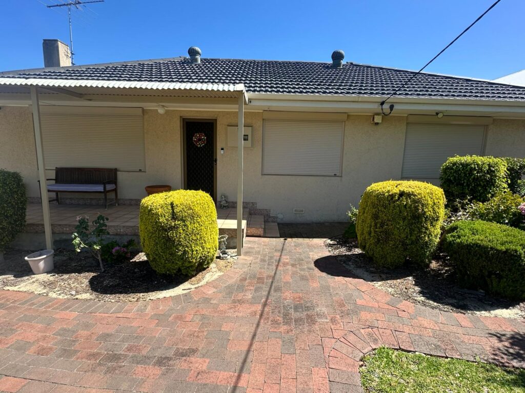 Classic Perth home with window roller shutters - roller shutters servicing extends lifespan